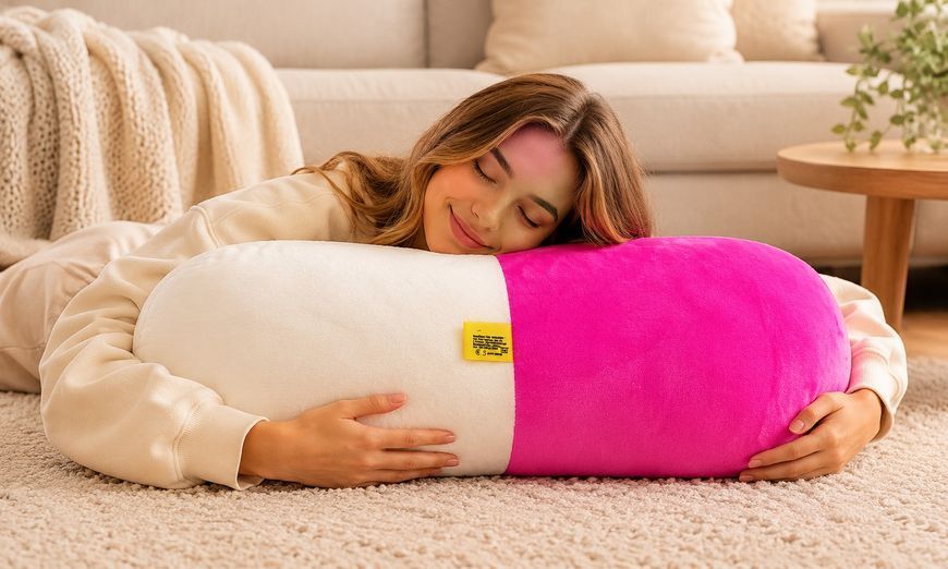 Подушка декор. TM MeriToys пігулка рожева 65х30см, 100% п/е, нап. силікон, 550г PILL_PINK фото
